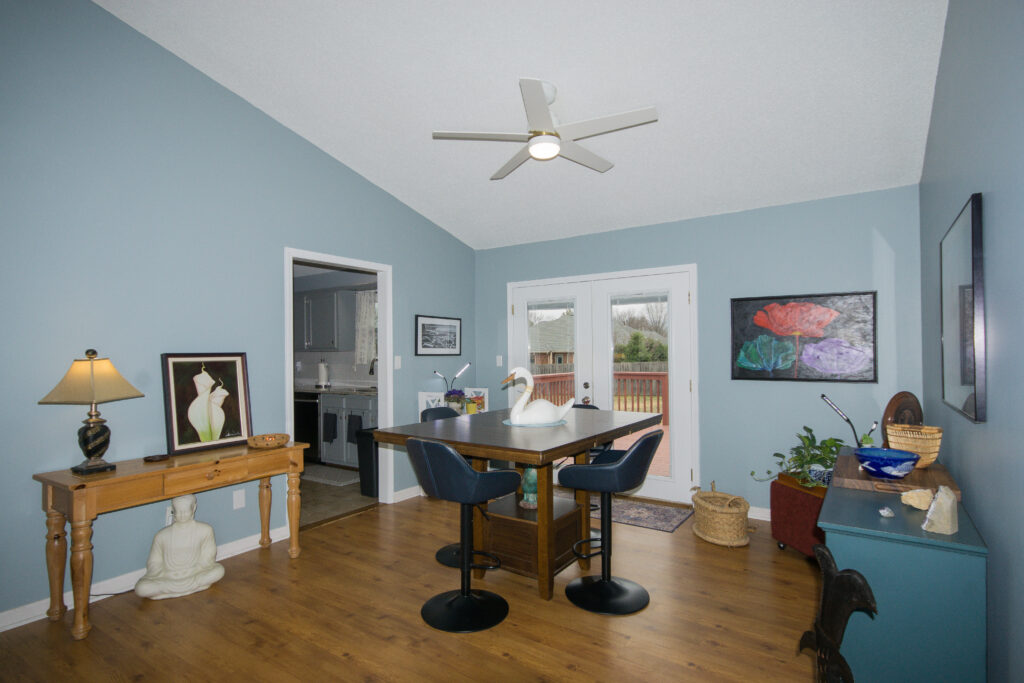 Family Room. New Paint, Vaulted Ceilings with ceiling fan, Madison Alabama Renovated home listed by John Wesley Brooks