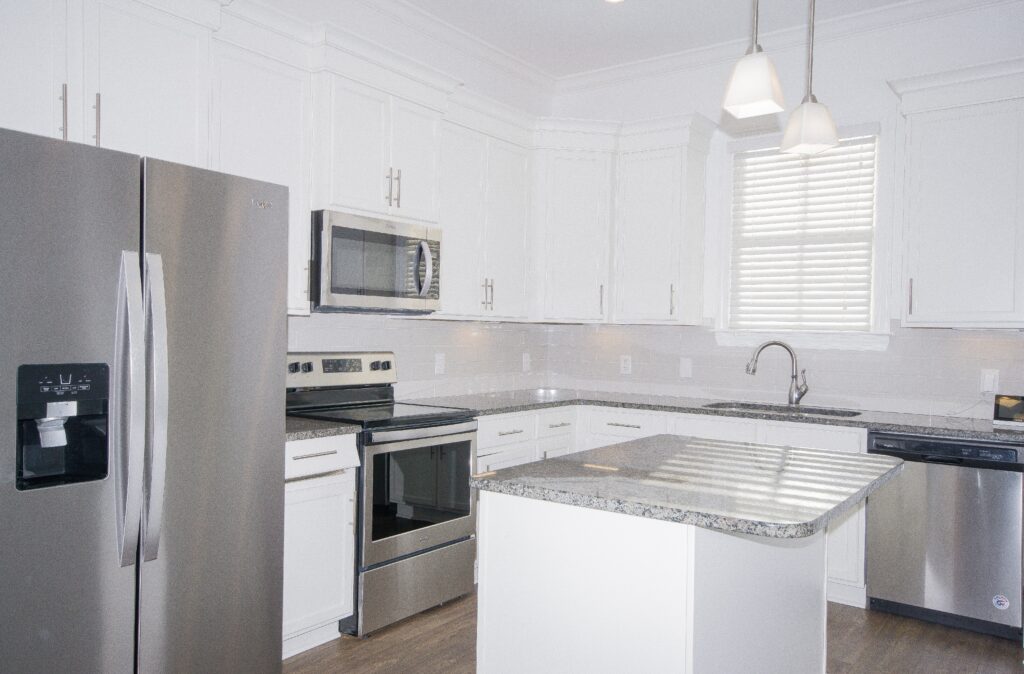 White upgraded kitchen, Granite counter tops, upgraded home for sale, village of providence home, realtor John Wesley Brooks, Huntsville Alabama home for sale