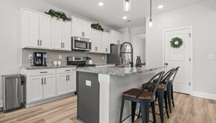 Home For Sale, Aerial Views, Custom Home, Modern design, kitchen and family room, full brick home listed by John Wesley Brooks