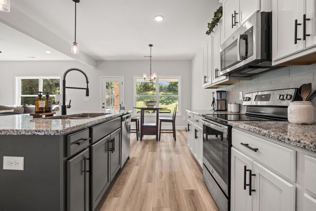 kitchen, wood floor, white cabinets, upgraded lights