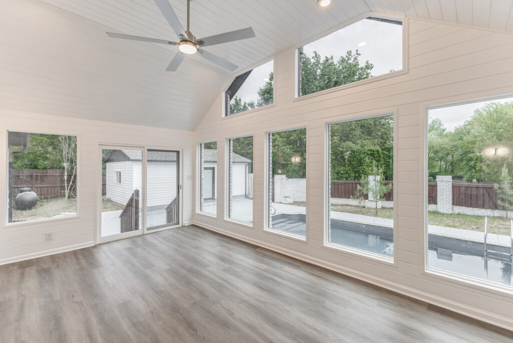 sunroom, open space, tall ceilings, overview to the backyard, pool, home renovations, athens alabama home listed by John Wesley Brooks