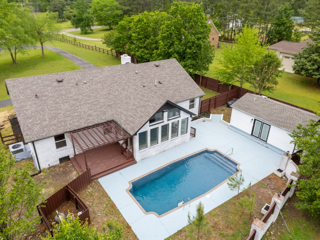 Renovated home with swimming pool, detached buildings, and land in Athens Alabama, Aerial View, Listed by John Wesley Brooks in Huntsville Alabama