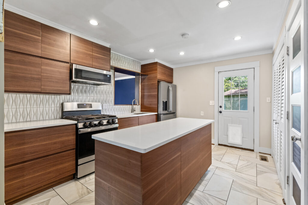 Mid century design renovation, home for sale, listed by John Wesley Brooks.