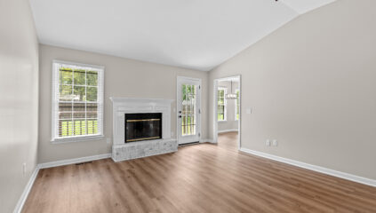 Charity Lane, Renovated Home, Everything has been updated, new paint, life proof LVP floors, Grey walls, tall vaulted ceilings, large treed lot, privacy fence, listed by John Wesley Brooks