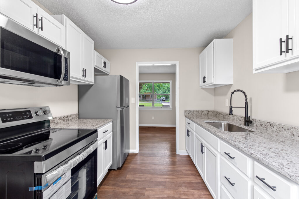 Huntsville, Renovated Kitchen, White cabinets, Stainless Steel Appliances, new paint, new plumbing, Property listed by John Wesley Brooks in Huntsville Alabama