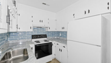 Kitchen view, updated kitchen, white cabinets, subway tile backsplash, new lights, white appliances, condo for sale, huntsville alabama, John Wesley Brooks