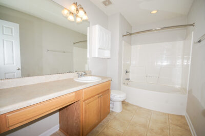 Bathroom view, cabinets, bath tub, tile flooring, home for sale in  Madison Alabama, John Wesley Brooks Top Realtor