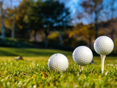 Which Neighborhoods in Athens or Huntsville Are Closest to Golf Courses?
