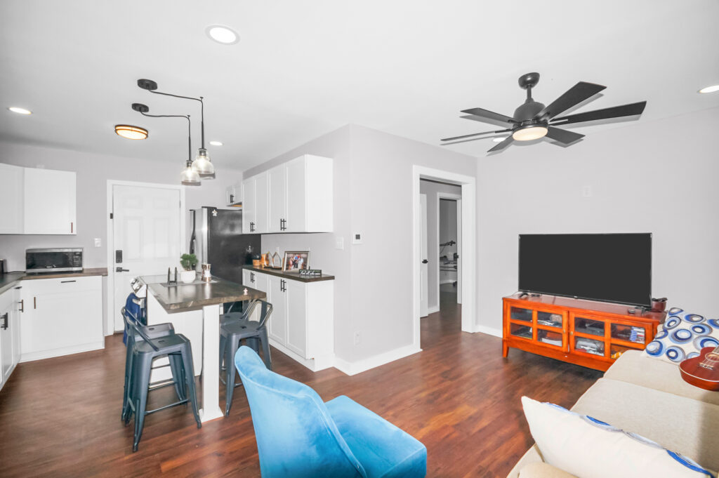 Renovated and move in ready home, perfect first time home buyer property, or investment, upgraded, gray walls, wood floors, upgraded lighting and plumbing, listed by Top Realtor, John Wesley Brooks