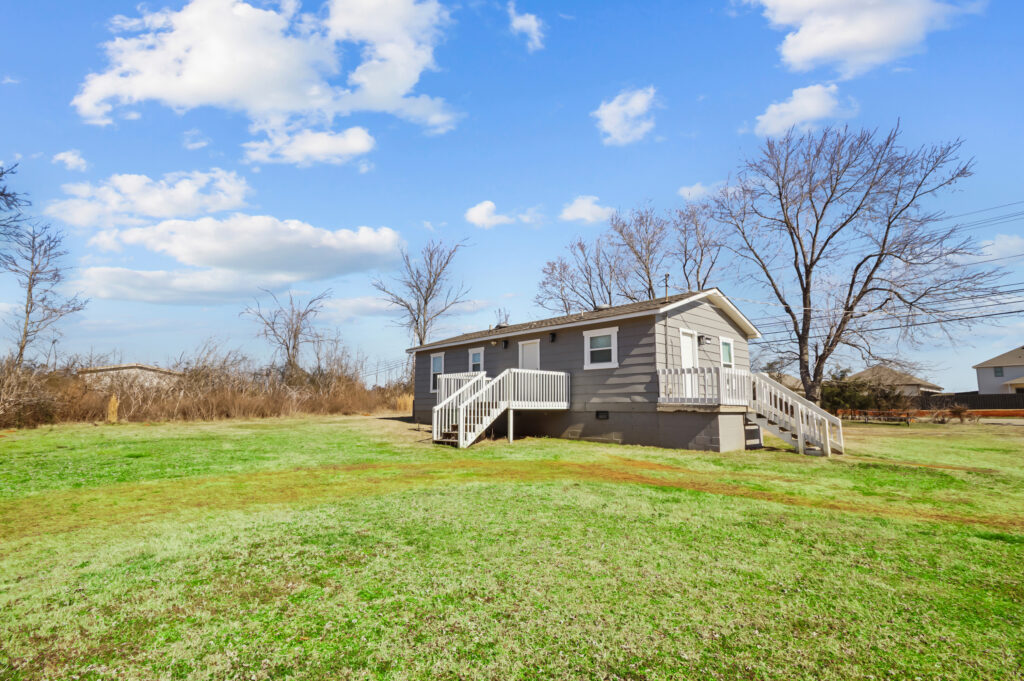 Half an acre lot, corner lot home, renovated home, new deck, listed by Huntsville's best realtor, John Wesley Brooks