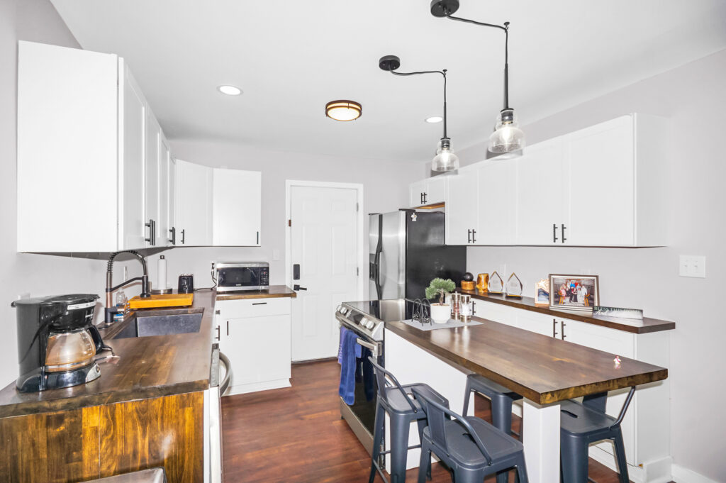 Move in ready home ,wood floors, updated home, white cabinets, recess can lights, stainless steel appliances, home for sale in huntsville by top realtor John Wesley Brooks