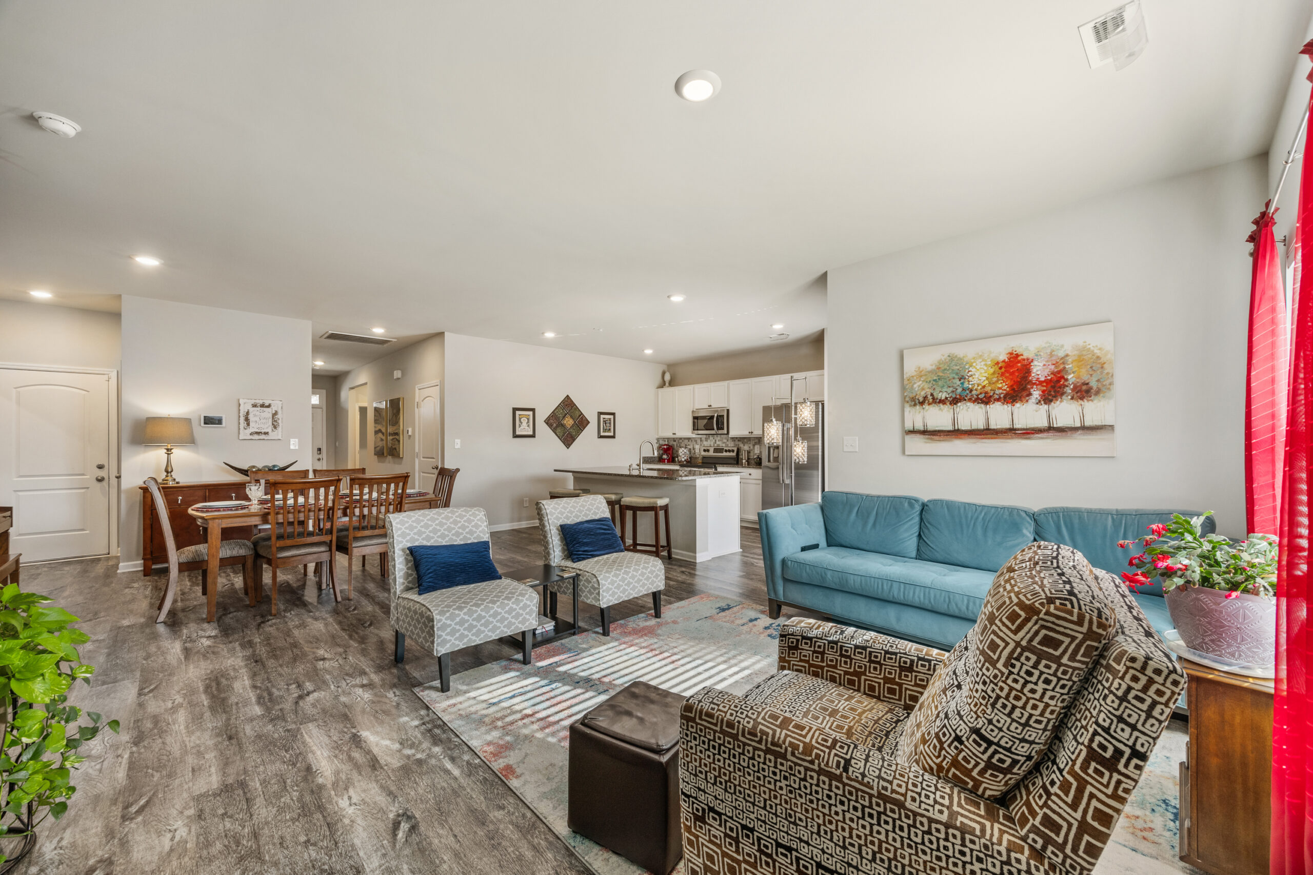 183 Kingsford Street Meridianville Alabama Family room open floor plan, gray walls, lvp floors, property listed by Huntsville best Realtor, John Wesley Brooks
