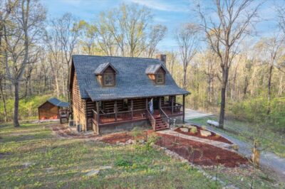 Custom log cabin outside of Huntsville Alabama, Basement home with chicken coop, detached building, mountain views, upgraded home, listed by the best realtor in Huntsville Alabama John Wesley Brooks