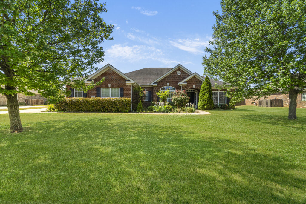 Semi custom Home for sale in Meridianville alabama, Front yard, green grass, full brick home, one story home listed by John Wesley Brooks, best Huntsville Realtor