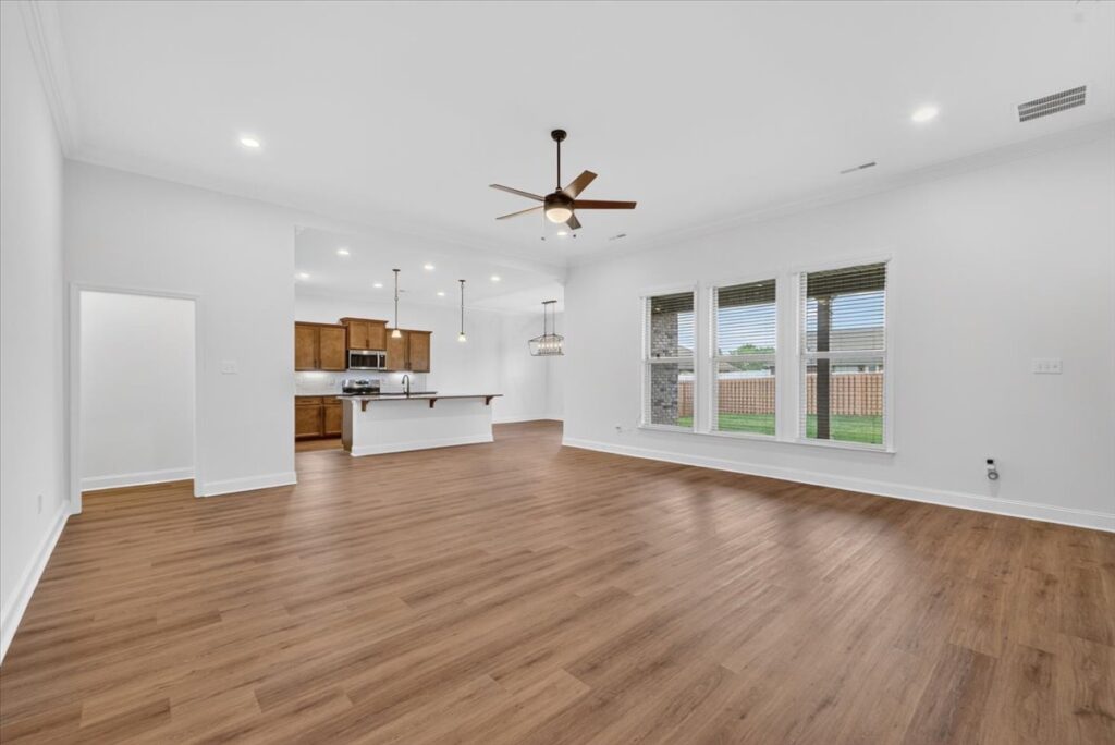 Open floor plan, move in ready home, new home for sale, Harvest alabama home for sale, Best Realtor in Huntsville John Wesley Brooks, Huntsville best realtor, Light walls, Ceiling fan, recess can lights, windows, natural light