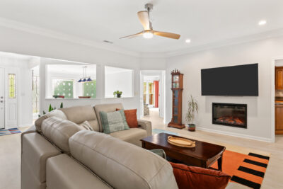 Family room view, modern mid century design, tall smooth ceiling, renovated home for sale in Hampton Cove Alabama, Huntsville Best Realtor John Wesley Brooks