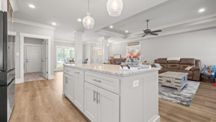 Custom designed and move in ready home, kitchen island, wood floors, smooth ceilings, grey walls, open floor plan, modern lights, Toney Alabama home for sale, Listed by The Best Realtor in Huntsville, John Wesley Brooks top Realtor in Huntsville