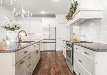 Dream custom designed kitchen, Island, White Cabinets, wood floors, kitchen hood, farm house design, stainless steel appliances, upgraded plumbing and light fixtures, Modern Design, HGTV inspired home, Meridianville Alabama home for sale, Listed by Huntsville's best Realtor John Wesley Brooks