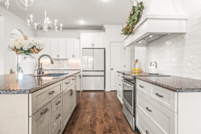 Dream custom designed kitchen, Island, White Cabinets, wood floors, kitchen hood, farm house design, stainless steel appliances, upgraded plumbing and light fixtures, Modern Design, HGTV inspired home, Meridianville Alabama home for sale, Listed by Huntsville's best Realtor John Wesley Brooks