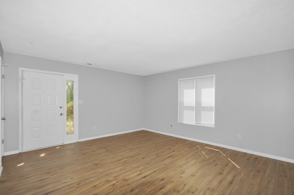 Family Room, Updated LVP Floors, Grey Walls, New Paint, blinds, Open space, Renovated quad for sale in Huntsville Alabama, Listed by Huntsville Alabama best Realtor