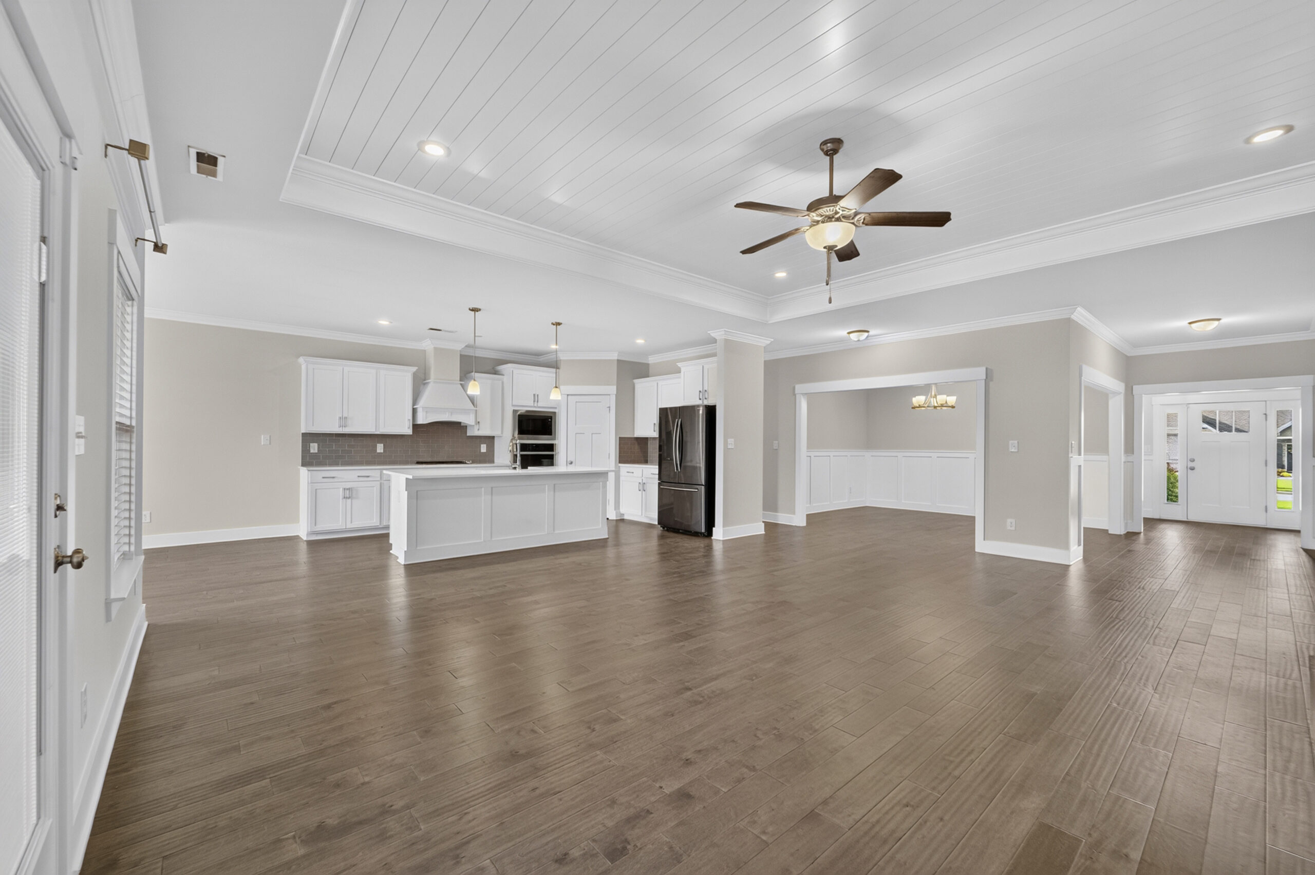 Kitchen, white cabinets, ceiling fan, shiplap, lvp, Best custom home in Madison Alabama, John Wesley Brooks