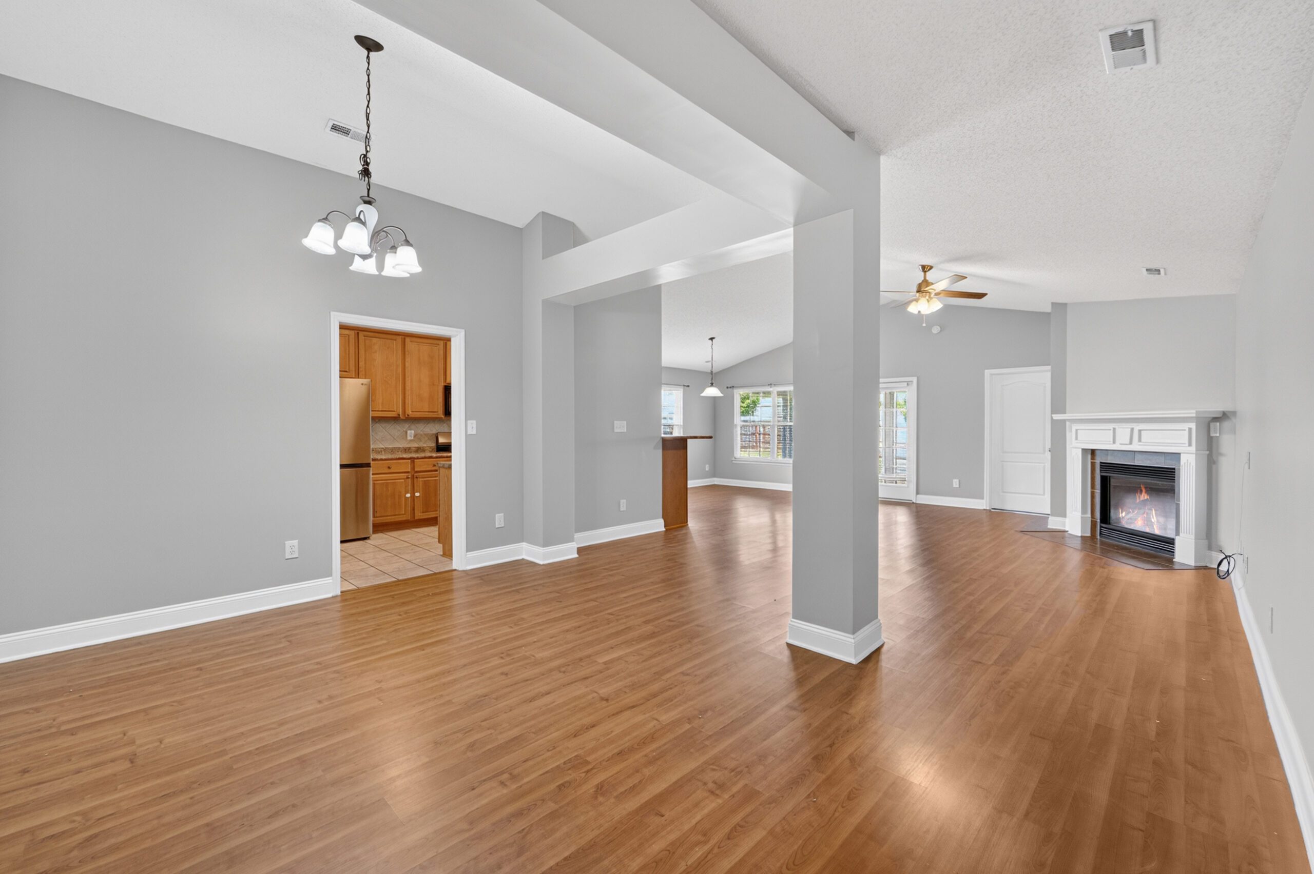 Family room, hardwood floors, grey paint, white ceiling, open floor plans